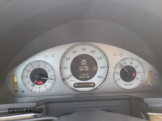 2007 Mercedes-Benz E-Class 3.5L with VIN WDBUF56X77B166210, listed as a Copart auction lot 51114065 with 165,297 mi miles and Salvage Title. Bid and sale history available at carsss.com. Image 9.