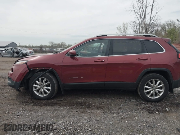 2015 Jeep Cherokee Limited with VIN 1C4PJMDSXFW604627, listed as a IAAI auction lot 42072953 with 102,501 mi miles and . Bid and sale history available at DreamBid. Image 14.