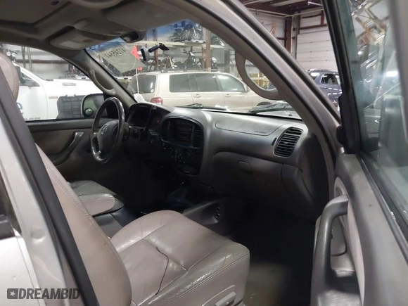 2004 Toyota Sequoia SR5 with VIN 5TDBT44A64S227125, listed as a IAAI auction lot 41245341 with 220,014 mi miles. Bid and sale history available at carsss.com. Image 5.
