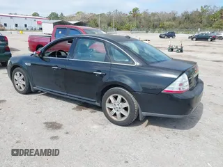 2008 Ford Taurus Limited with VIN 1FAHP28WX8G149284, listed as a IAAI auction lot 41530073 with 149,398 mi miles. Bid and sale history available at carsss.com. Image 3.