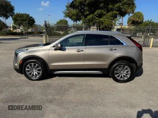 2023 Cadillac XT4 AWD Premium Luxury with VIN 1GYFZDR40PF108407, listed as a Copart auction lot 54799365 with 8,724 mi miles and Non Repairable. Bid and sale history available at carsss.com. Image 12.