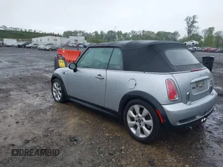 2006 MINI Convertible S with VIN WMWRH33586TF88407, listed as a IAAI auction lot 42223156 with 199,948 mi miles and . Bid and sale history available at DreamBid. Image 3.