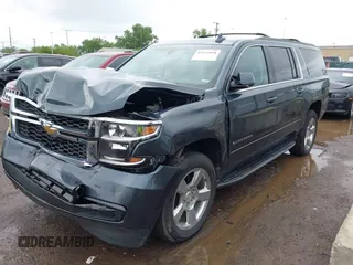 2019 Chevrolet Suburban LS with VIN 1GNSKGKC7KR244916, listed as a IAAI auction lot 42315858 with 69,555 mi miles and . Bid and sale history available at DreamBid. Image 2.