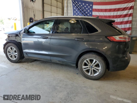 2019 Ford Edge SEL with VIN 2FMPK4J95KBB14991, listed as a Copart auction lot 60068825 with 68,850 mi miles and Salvage title. Bid and sale history available at DreamBid. Image 2.