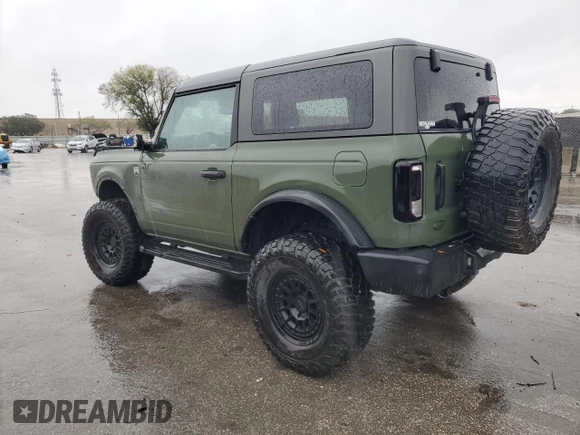 2021 Ford Bronco with VIN 1FMDE5AH7MLA79865, listed as a Copart auction lot 46552595 with 33,636 mi miles and Salvage Title. Bid and sale history available at carsss.com. Image 2.