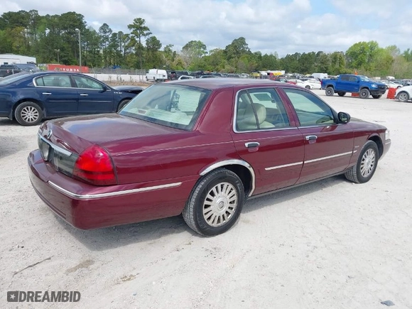 2006 Mercury Grand Marquis LS Premium with VIN 2MEHM75V26X621396, listed as a IAAI auction lot 41928996 with 230,311 mi miles. Bid and sale history available at carsss.com. Image 4.