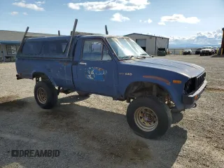 1983 Toyota Pickup z VIN JT4RN48D0D0062446, wystawiony jako Copart lot #59037805 z przebiegiem 157 999 mil mil oraz Czysty tytuł • Clean title. Historia ofert i sprzedaży dostępna na DreamBid. Obrazek 4.