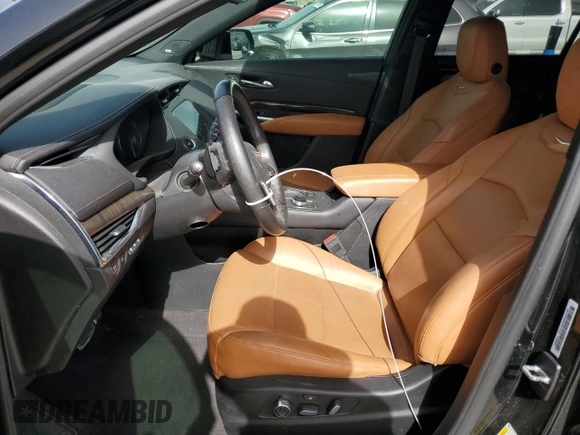 2020 Cadillac XT4 FWD Sport z VIN 1GYFZER49LF079277, wystawiony jako Copart lot #46980405 z przebiegiem 64 140 mil mil oraz Szkoda całkowita • Salvage title. Historia ofert i sprzedaży dostępna na DreamBid. Obrazek 7.