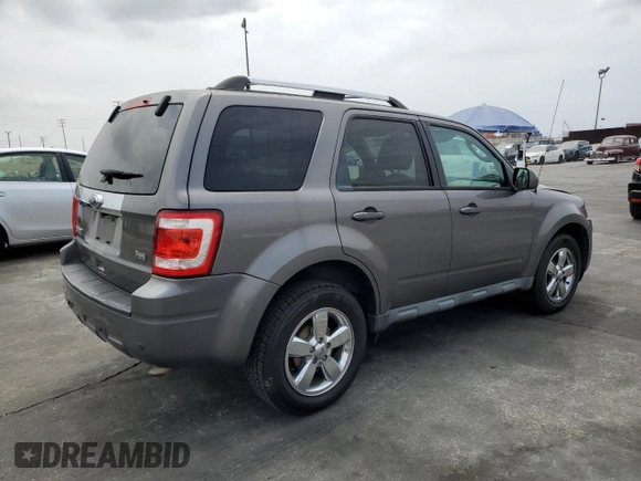 2010 Ford Escape Limited с VIN 1FMCU0EG8AKD06419, выставлен на аукционе Copart как лот 62357115 с пробегом 138 687 миль миль и Списание • Salvage title. История ставок и продаж доступна на DreamBid. Изображение 3.