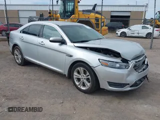 2014 Ford Taurus SEL z VIN 1FAHP2E98EG178504, wystawiony jako IAAI lot #42184983 z przebiegiem 166 705 mil mil oraz . Historia ofert i sprzedaży dostępna na DreamBid. Obrazek 1.