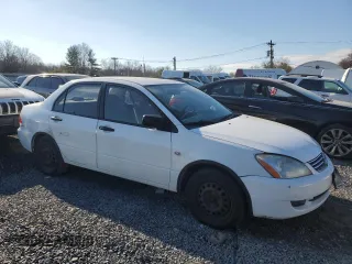 2006 Mitsubishi Lancer ES with VIN JA3AJ26EX6U046984, listed as a Copart auction lot 82014204 with 157,391 mi miles and Salvage Title. Bid and sale history available at carsss.com. Image 4.