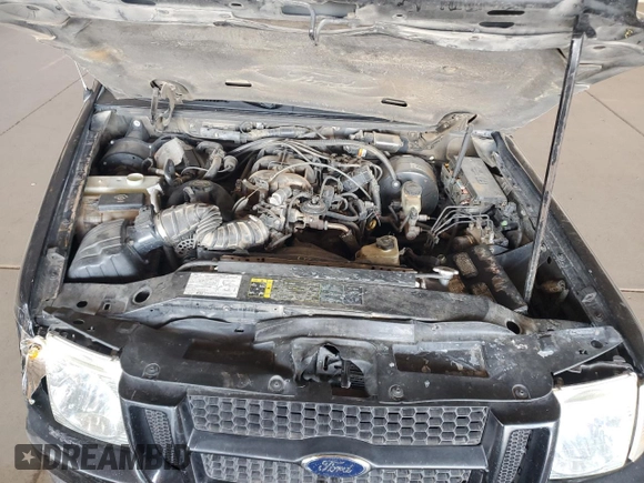 2005 Ford Explorer Sport Trac XLS с VIN 1FMZU67K15UA23188, выставлен на аукционе Copart как лот 61647445 с пробегом 212 302 миль миль и Списание • Salvage title. История ставок и продаж доступна на DreamBid. Изображение 11.