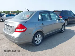 2007 Nissan Versa SL with VIN 3N1BC11E47L404371, listed as a IAAI auction lot 40309667 with 131,954 mi miles and . Bid and sale history available at DreamBid. Image 4.