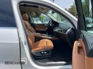 2020 BMW X7 xDrive40i z VIN 5UXCW2C0XL9B92841, wystawiony jako Copart lot #58982025 z przebiegiem 127 416 mil mil oraz Czysty tytuł • Clean title. Historia ofert i sprzedaży dostępna na DreamBid. Obrazek 5.