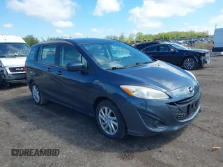 2012 Mazda 5 Sport with VIN JM1CW2BL4C0107491, listed as a IAAI auction lot 42191489 with 108,411 mi miles and . Bid and sale history available at DreamBid. Image 1.