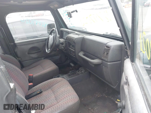 1999 Jeep Wrangler SE z VIN 1J4FY29P7XP479351, wystawiony jako IAAI lot #42797020 z przebiegiem 171 598 mil mil oraz . Historia ofert i sprzedaży dostępna na DreamBid. Obrazek 5.