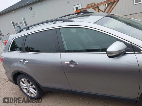 2012 Mazda CX-9 Grand Touring z VIN JM3TB3DA0C0337713, wystawiony jako IAAI lot #42368488 z przebiegiem 184 220 mil mil oraz . Historia ofert i sprzedaży dostępna na DreamBid. Obrazek 13.