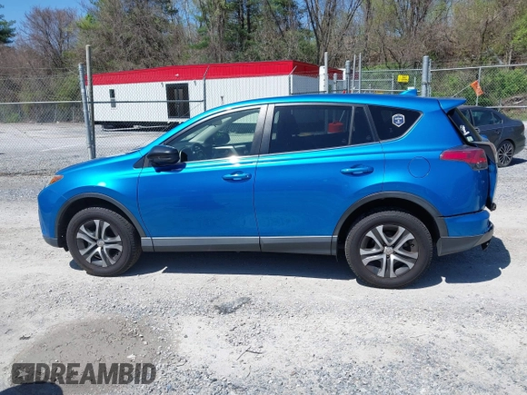 2018 Toyota RAV4 LE with VIN JTMZFREV4JJ734702, listed as a IAAI auction lot 41987540 with 141,526 mi miles. Bid and sale history available at carsss.com. Image 14.