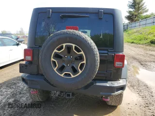 2015 Jeep Wrangler Unlimited Rubicon Hard Rock z VIN 1C4HJWFG5FL706170, wystawiony jako Copart lot #55442965 z przebiegiem Nie podano mil oraz Czysty tytuł • Clean title. Historia ofert i sprzedaży dostępna na DreamBid. Obrazek 6.