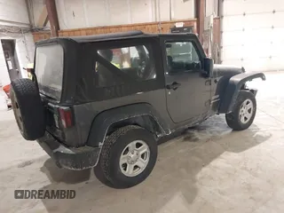 2014 Jeep Wrangler Sport with VIN 1C4AJWAG6EL167579, listed as a IAAI auction lot 41801276 with 137,639 mi miles and . Bid and sale history available at DreamBid. Image 4.