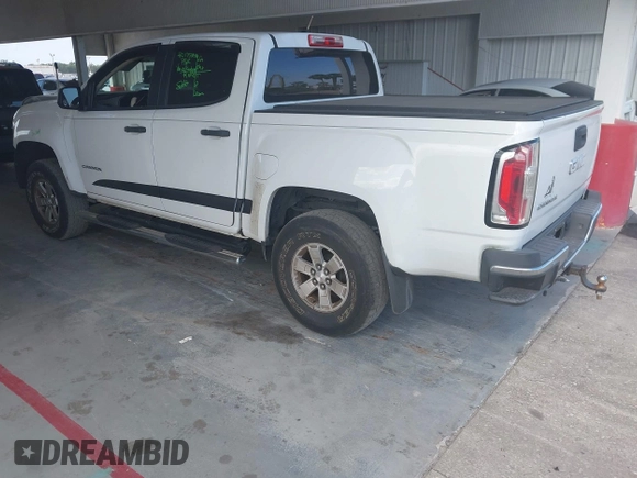 2015 GMC Canyon 2WD z VIN 1GTG5AEA8F1256722, wystawiony jako IAAI lot #42159367 z przebiegiem 140 963 mil mil oraz . Historia ofert i sprzedaży dostępna na DreamBid. Obrazek 3.