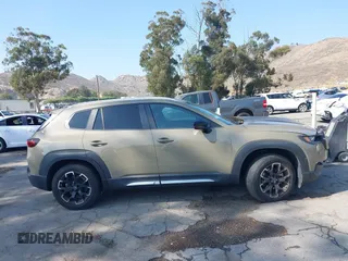 2023 Mazda CX-50 2.5 Turbo with VIN 7MMVABXY5PN120917, listed as a IAAI auction lot 42431995 with 34,421 mi miles and . Bid and sale history available at DreamBid. Image 14.