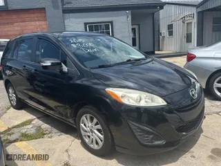 2015 Mazda Mazda5 Sport with VIN JM1CW2BLXF0182880, listed as a Copart auction lot 59904084 with 100,383 mi miles. Bid and sale history available at carsss.com. Image 1.