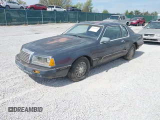 1984 Ford Thunderbird with VIN 1FABP46F1EH236498, listed as a IAAI auction lot 42025335 with 59,589 mi miles and . Bid and sale history available at DreamBid. Image 2.
