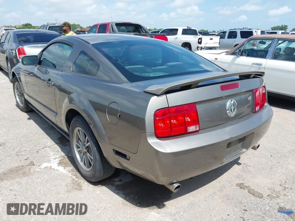 2005 Ford Mustang Deluxe with VIN 1ZVFT80NX55145615, listed as a IAAI auction lot 42511360 with 236,242 mi miles and . Bid and sale history available at DreamBid. Image 3.