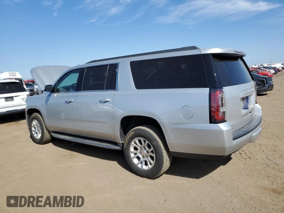 2016 GMC Yukon XL SLE with VIN 1GKS2FKC4GR285826, listed as a Copart auction lot 69486214 with 58,879 mi miles and Clean Title. Bid and sale history available at DreamBid. Image 2.