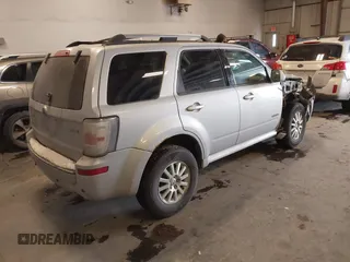 2008 Mercury Mariner Premier z VIN 4M2CU97118KJ51511, wystawiony jako IAAI lot #41573967 z przebiegiem 226 840 mil mil oraz . Historia ofert i sprzedaży dostępna na DreamBid. Obrazek 4.