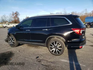 2021 Honda Pilot Touring 8-Passenger with VIN 5FNYF5H94MB039974, listed as a Copart auction lot 82654964 with 54,048 mi miles and Salvage Title. Bid and sale history available at DreamBid. Image 2.