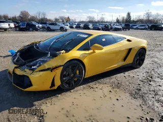 2014 Lamborghini Gallardo z VIN ZHWGU5BZ7ELA13923, wystawiony jako Copart lot #82374714 z przebiegiem 33 260 mil mil oraz Szkody całkowita. Historia ofert i sprzedaży dostępna na DreamBid. Obrazek 1.