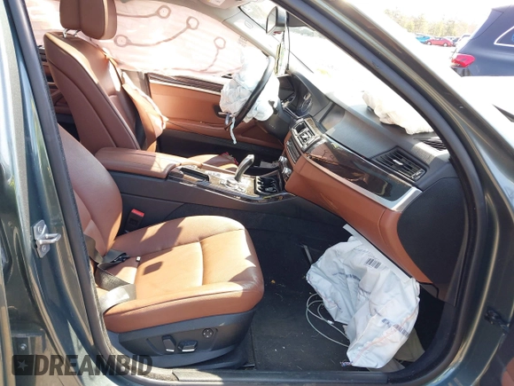 2011 BMW 5 Series 535i xDrive with VIN WBAFU7C56BC771267, listed as a IAAI auction lot 42006086 with 123,249 mi miles. Bid and sale history available at carsss.com. Image 5.
