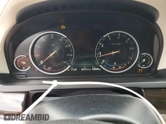 2015 BMW 7 Series 750Li z VIN WBAYE8C56FD781213, wystawiony jako Copart lot #55843955 z przebiegiem 63 899 mil mil oraz Szkoda całkowita • Salvage title. Historia ofert i sprzedaży dostępna na DreamBid. Obrazek 9.