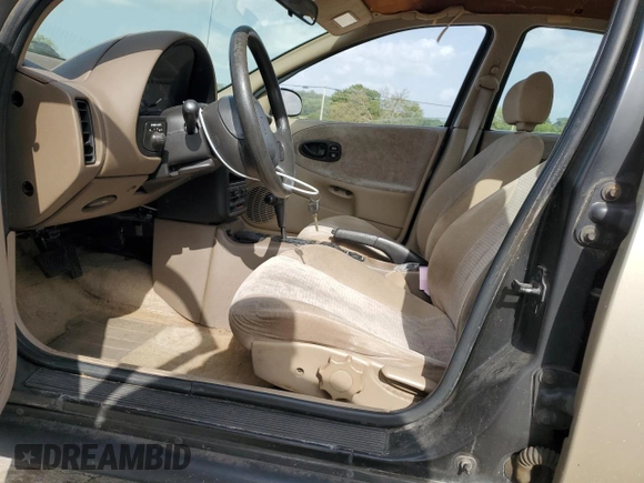 1998 Saturn SL with VIN 1G8ZK5270WZ240303, listed as a Copart auction lot 65364164 with 156,699 mi miles and Salvage title. Bid and sale history available at DreamBid. Image 7.