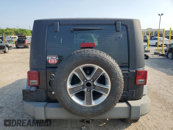 2009 Jeep Wrangler X with VIN 1J4FA24159L772540, listed as a Copart auction lot 62183815 with 179,628 mi miles and Salvage title. Bid and sale history available at DreamBid. Image 6.