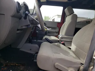 2008 Jeep Wrangler Sahara with VIN 1J4FA54178L566037, listed as a Copart auction lot 61439685 with 115,812 mi miles and Salvage title. Bid and sale history available at DreamBid. Image 7.