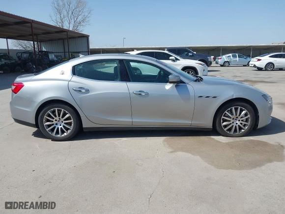 2014 Maserati Ghibli S Q4 with VIN ZAM57RTA8E1085631, listed as a IAAI auction lot 41829745 with 80,418 mi miles. Bid and sale history available at carsss.com. Image 13.