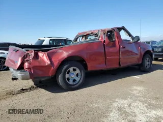 2000 Ford F-150 XL with VIN 1FTZX1728YNA87502, listed as a Copart auction lot 54870295 with 219,971 mi miles and Salvage title. Bid and sale history available at DreamBid. Image 3.