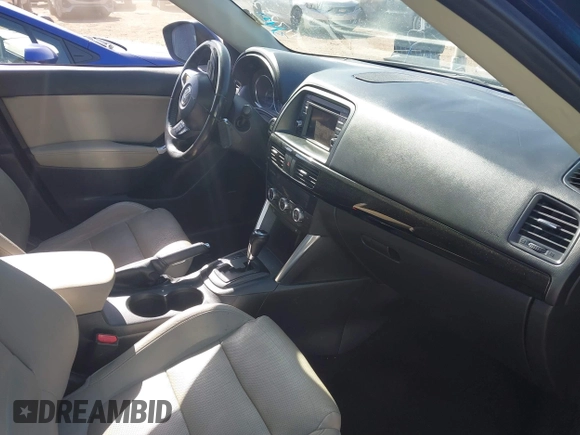 2014 Mazda CX-5 Grand Touring with VIN JM3KE2DY2E0349343, listed as a IAAI auction lot 41725214 with 271,094 mi miles. Bid and sale history available at carsss.com. Image 5.