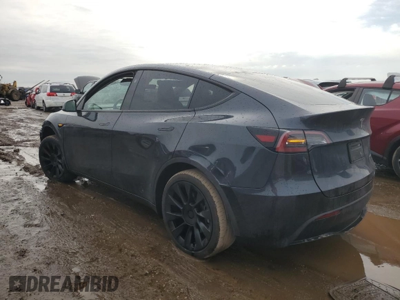 2024 Tesla Model Y Long Range with VIN 7SAYGAEE7RF043096, listed as a Copart auction lot 46939395 with 12,521 mi miles and Salvage Title. Bid and sale history available at DreamBid. Image 2.