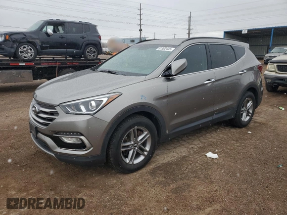 2017 Hyundai Santa Fe 2.4L z VIN 5NMZUDLB7HH030253, wystawiony jako Copart lot #51302445 z przebiegiem 136 074 mil mil oraz Szkoda całkowita • Salvage title. Historia ofert i sprzedaży dostępna na DreamBid. Obrazek 1.