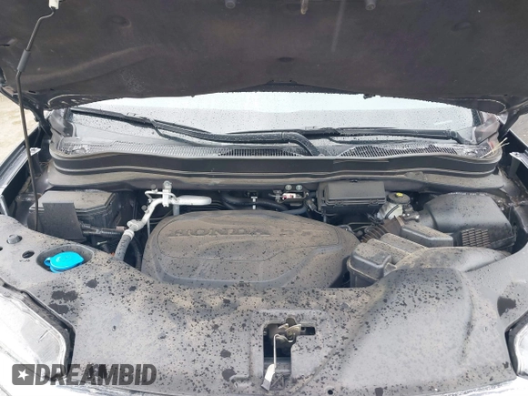 2021 Honda Pilot Touring 8-Passenger with VIN 5FNYF5H9XMB014190, listed as a IAAI auction lot 41749586 with 67,602 mi miles and . Bid and sale history available at DreamBid. Image 10.
