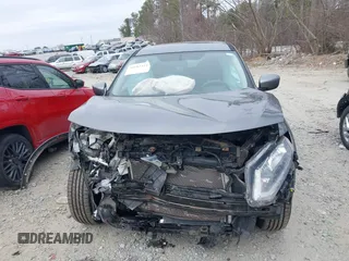 2016 Nissan Rogue S with VIN JN8AT2MV6GW131099, listed as a IAAI auction lot 41185415 with 107,302 mi miles. Bid and sale history available at carsss.com. Image 12.