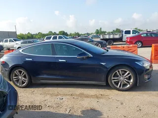 2014 Tesla Model S 60 with VIN 5YJSA1H12EFP39873, listed as a IAAI auction lot 42443414 with 132,773 mi miles and . Bid and sale history available at DreamBid. Image 13.