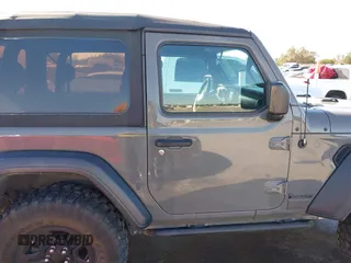 2018 Jeep Wrangler Sport S with VIN 1C4GJXAG4JW283209, listed as a IAAI auction lot 41770557 with 34,041 mi miles and . Bid and sale history available at DreamBid. Image 13.