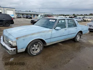 1989 Chevrolet Caprice z VIN 1G1BN51E8KR219541, wystawiony jako Copart lot #78588294 z przebiegiem 54 750 mil mil oraz Czysty tytuł • Clean title. Historia ofert i sprzedaży dostępna na DreamBid. Obrazek 1.