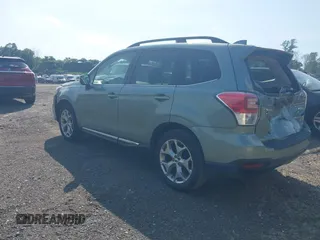 2017 Subaru Forester Touring with VIN JF2SJAWC8HH579492, listed as a IAAI auction lot 42571986 with 57,228 mi miles and . Bid and sale history available at DreamBid. Image 3.