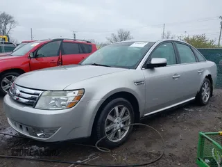 2008 Ford Taurus SEL with VIN 1FAHP24W68G122802, listed as a IAAI auction lot 42020217 with 168,265 mi miles. Bid and sale history available at carsss.com. Image 17.